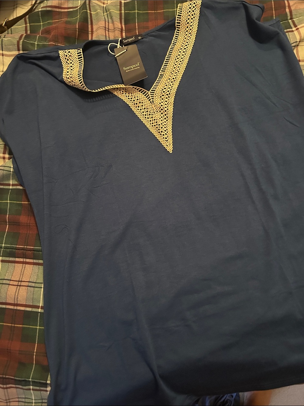 Woman’s Blue V-Neck Shirt with Contrast Trim